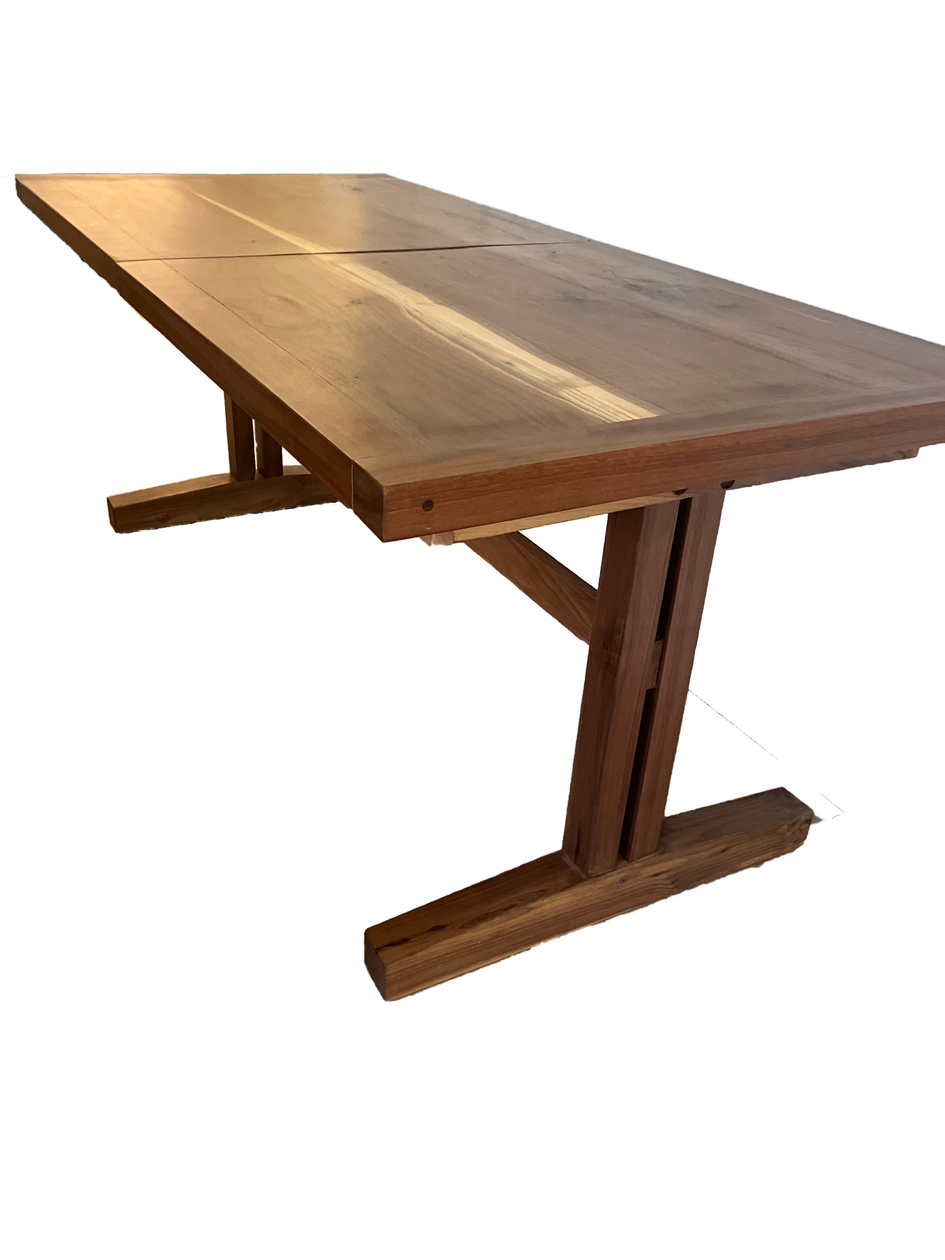 Black Walnut expandable dining table with Walnut Trestle base